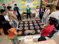 New Bedford High School Developing ESL teacher, Brittany Jenney, greets her Spanish speaking students in English as students across New Bedford return to school.  [ PETER PEREIRA/THE STANDARD-TIMES/SCMG ]